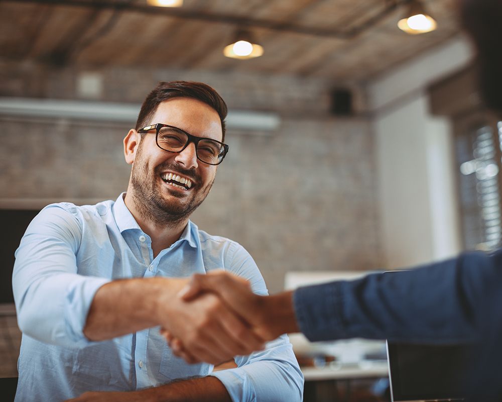 two professionals shaking hands